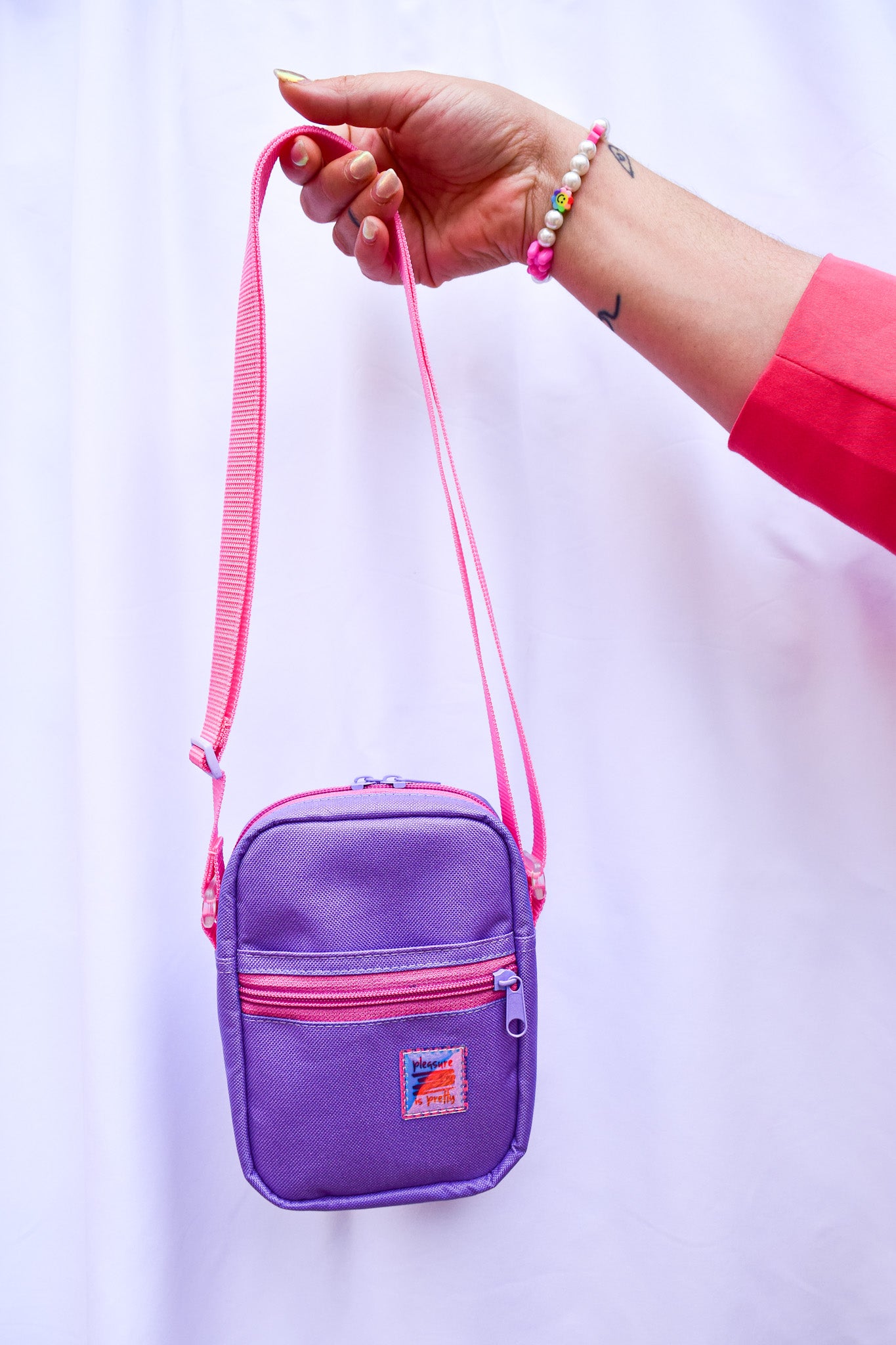 Pleasure is pretty lila crossbody
