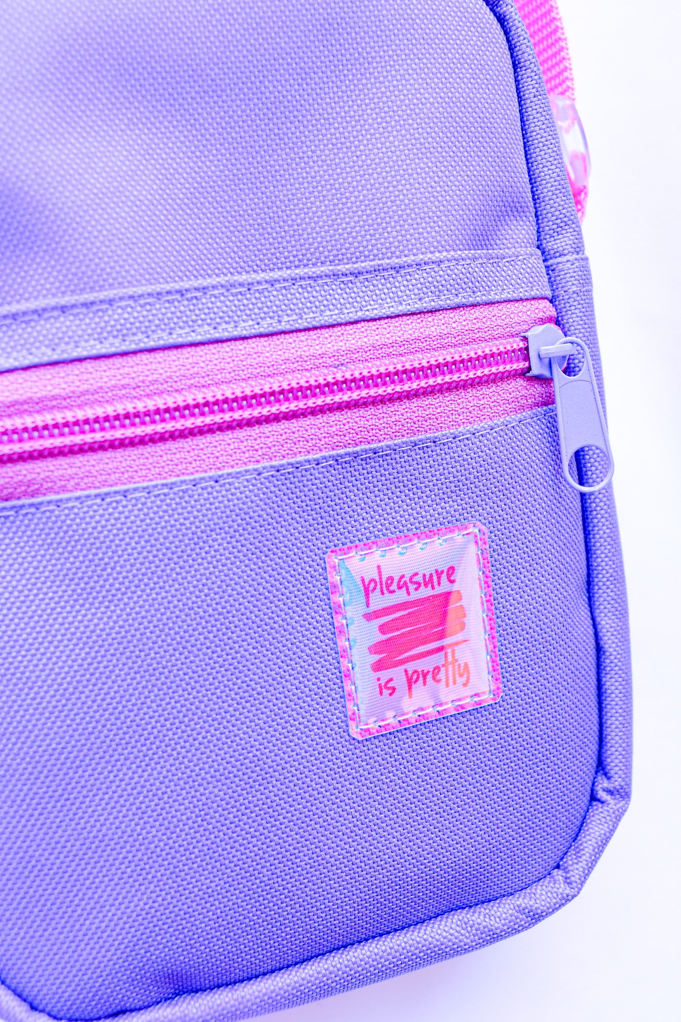 Pleasure is pretty lila crossbody