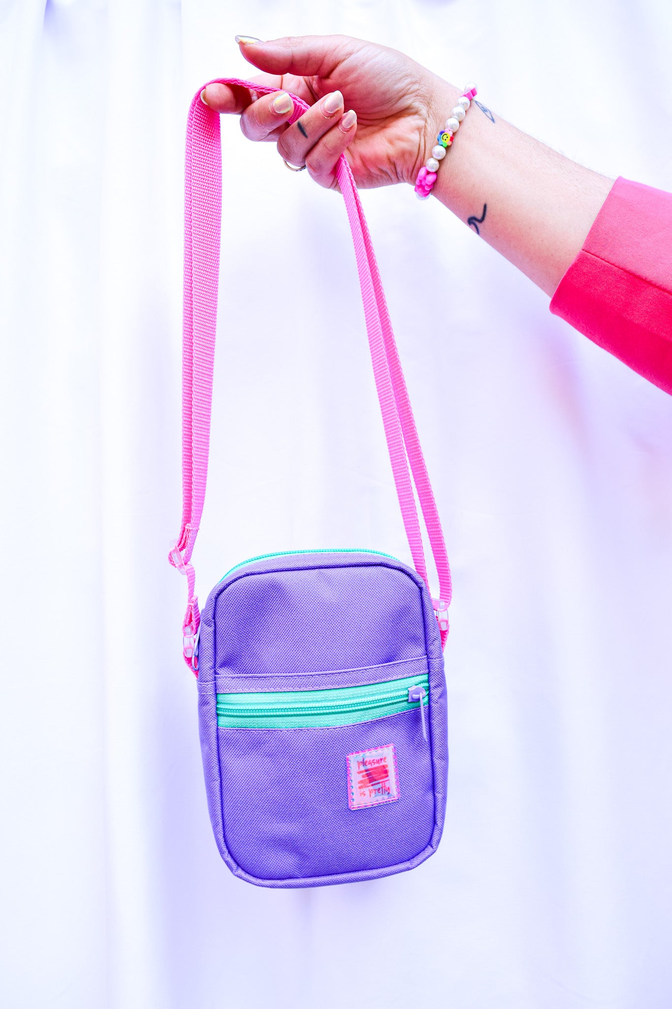 Pleasure is pretty lila crossbody
