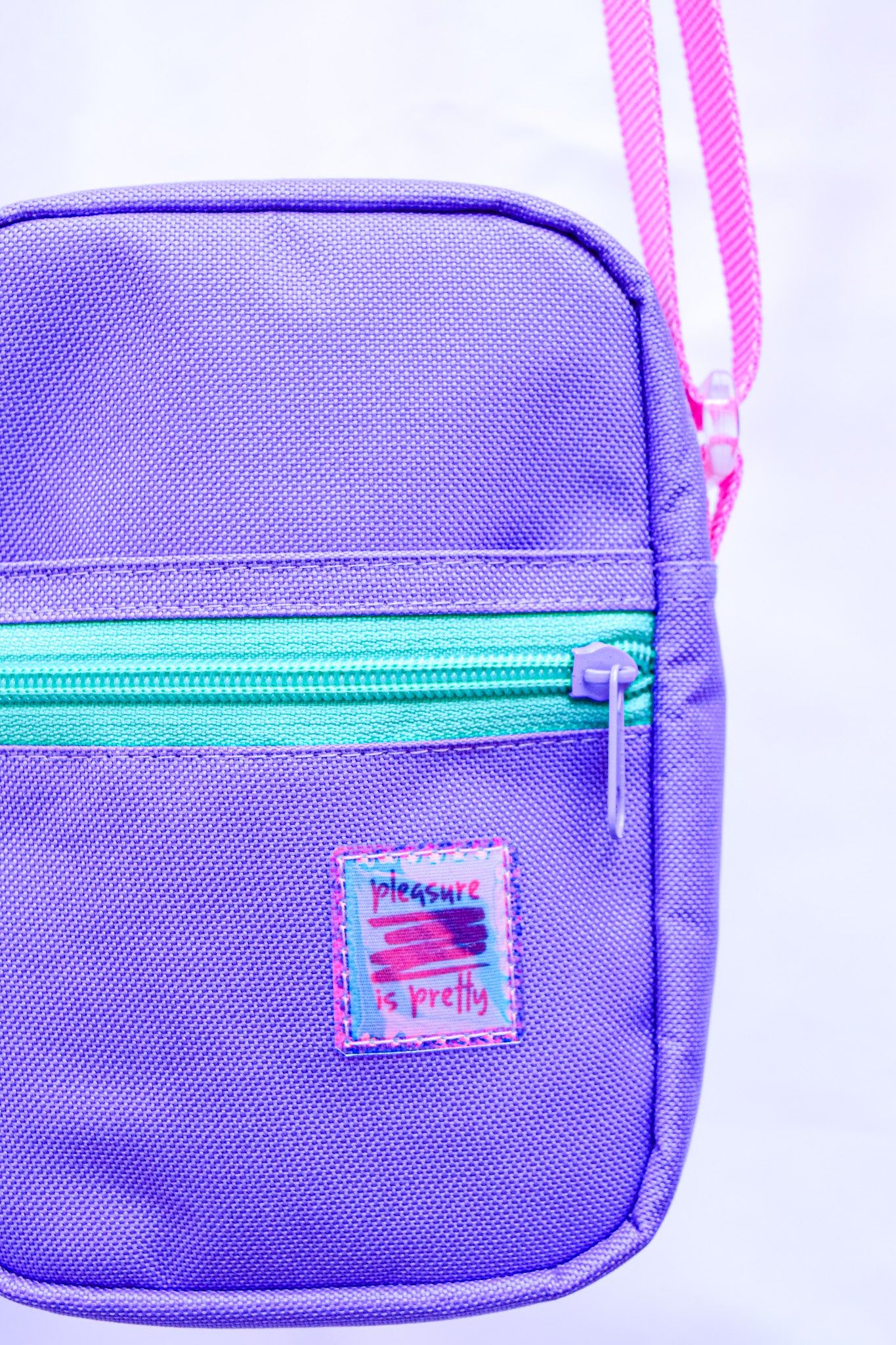 Pleasure is pretty lila crossbody